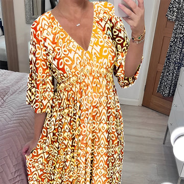 Eugenia - Abito floreale scollato e leggero